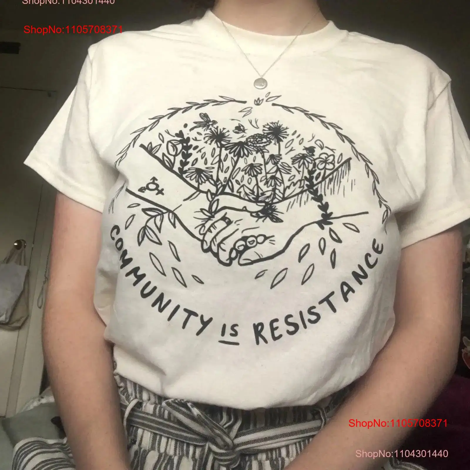 community is resistance T Shir - Vintage Fashion Community recension och pris